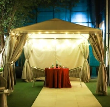 candlelight dinners Intimate Cabana Dining Experience by Hilton