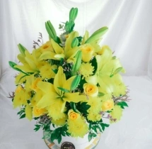 surprises Sunshine Yellow Lilies and Roses Bouquet
