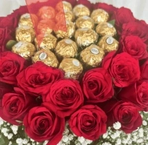 surprises Deluxe Red Rose Chocolate Gift Basket