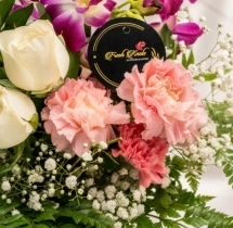surprises Vibrant Orchid and Rose Vase Bouquet