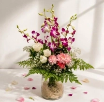 surprises Vibrant Orchid and Rose Vase Bouquet