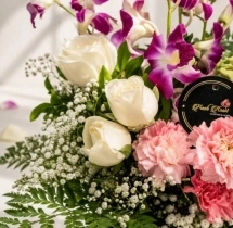 surprises Vibrant Orchid and Rose Vase Bouquet